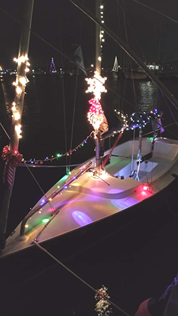Sailboat decorated with Christmas lights